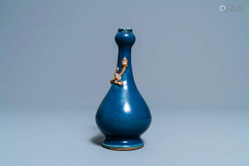 A Chinese monochrome blue garlic head vase with applied