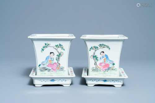 A pair of Chinese famille rose jardiniÃ¨res on stands,