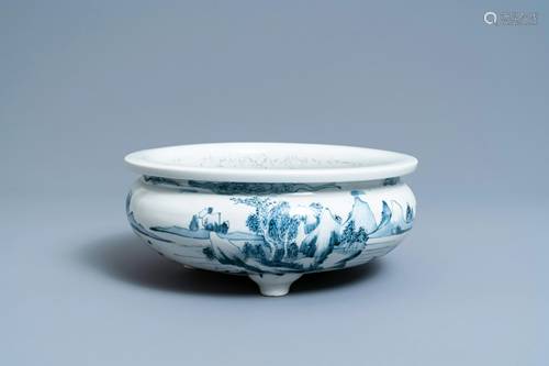 A Chinese blue and white tripod censer with a