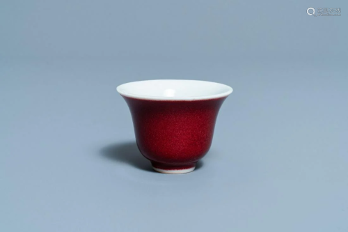A Chinese monochrome sang de boeuf-glazed wine cup,