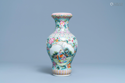 A Chinese famille rose vase with figures in a garden,