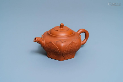 A Chinese Yixing stoneware lotus-shaped teapot and