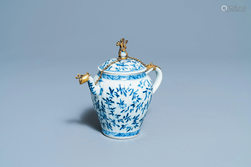 A Chinese gilt-mounted blue and white teapot and cover,