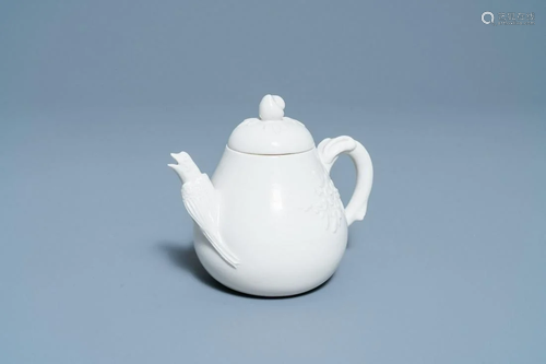 A Chinese Dehua blanc de Chine teapot, inscribed Yi