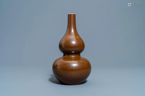 A Chinese monochrome brown-glazed double gourd vase,