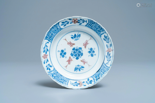 A Chinese blue, white and copper red 'fish' plate,