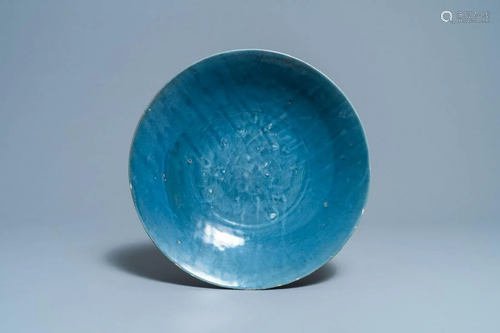 A Chinese monochrome blue Swatow dish with incised carp