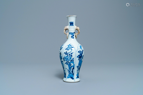 A Chinese blue and white vase with elephant-head