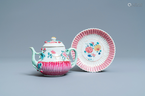 A Chinese famille rose teapot on stand with applied