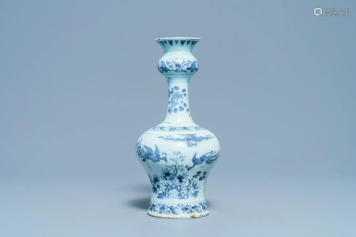 A Dutch Delft blue and white garlic head chinoiserie