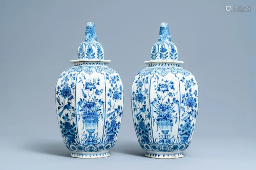 A pair of large Dutch Delft blue and white vases and
