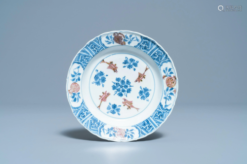 A Chinese blue, white and copper red 'fish' plate,