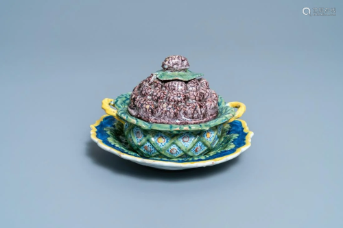 A polychrome Dutch Delft 'berry' tureen and cover on