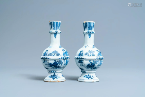 A pair of Dutch Delft blue and white chinoiserie vases,