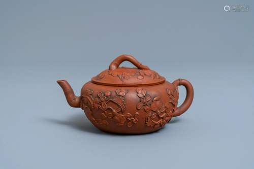 A Chinese Yixing stoneware teapot and cover with