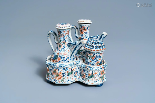 A Dutch Delft cashmere palette cruet set and shaker on