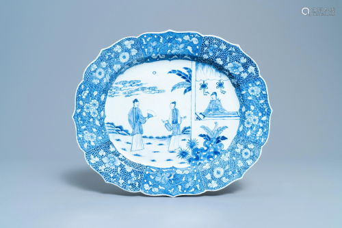 A large oval Chinese blue and white 'Romance of the