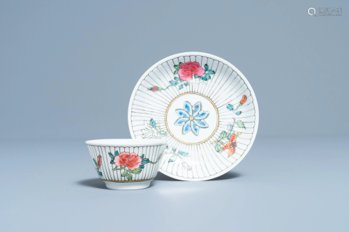 A Chinese famille rose cup and saucer with floral