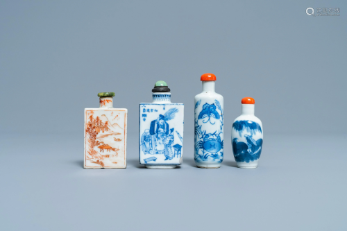 Four Chinese blue and white and iron-red snuff bottles,