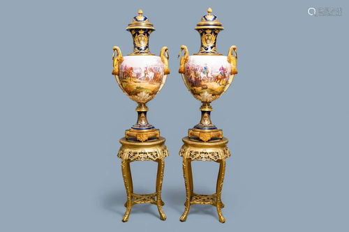 A pair of massive French Svres-style vases with gilt