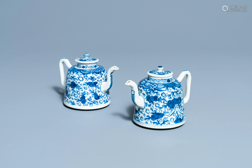 A pair of Chinese blue and white teapots and covers,