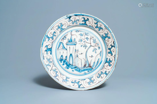 A blue, white and manganese Portuguese faience charger