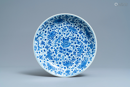 A Chinese blue and white charger with floral design,