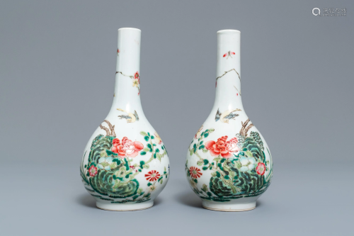 A pair of Chinese famille rose bottle vases, 19th C.