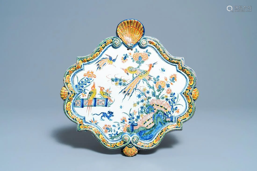 A polychrome Dutch Delft plaque with birds in a Chinese