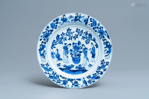 A Chinese blue and white dish with ladies around a