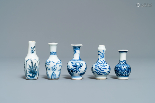 Fifteen Chinese mostly blue and white miniature vases,