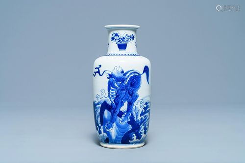 A Chinese blue and white rouleau vase with qilins,