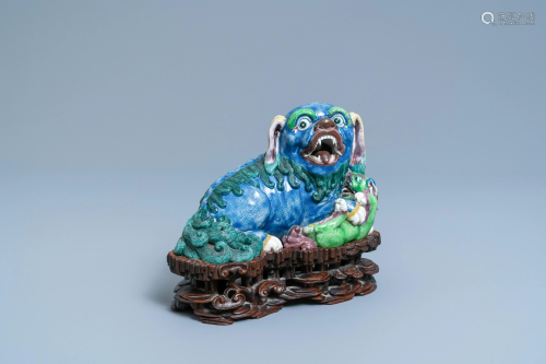 A Chinese porcelain 'Buddhist lion and cub' group on