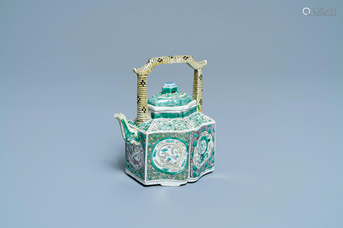 A Chinese verte biscuit teapot and cover, Kangxi