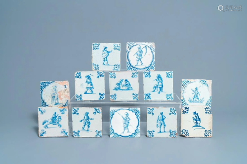 Twelve Dutch Delft blue and white tiles with figures,