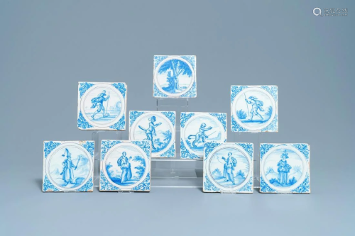 Nine blue, white and manganese Delft style tiles,