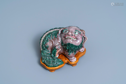 A Chinese porcelain 'Buddhist lion and cub' group on