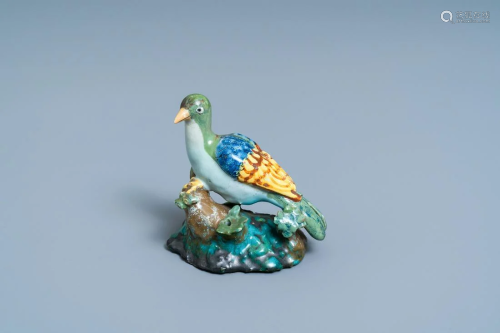 A polychrome Brussels faience model of a seated pigeon,
