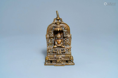 An inscribed silver- and brass-inlaid gilt bronze Jain