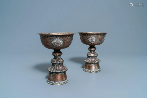 A pair of Tibetan silvered copper alloy altar bowls,
