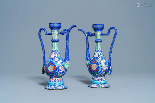 A pair of Chinese Canton enamel ewers for the