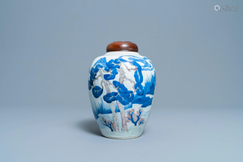 A Chinese blue, white, celadon and copper red vase with