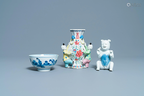 A Chinese blue and white bowl, a figure of a boy and a