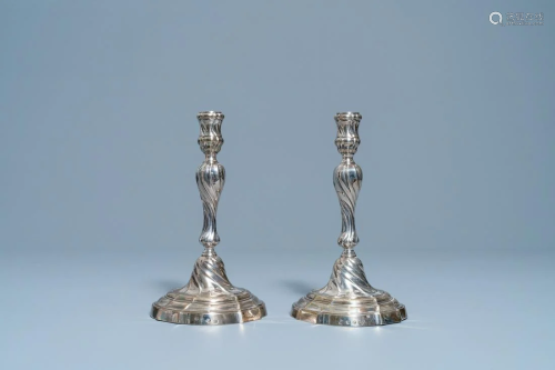 A pair of silver candlesticks, marked Carel Benninck,