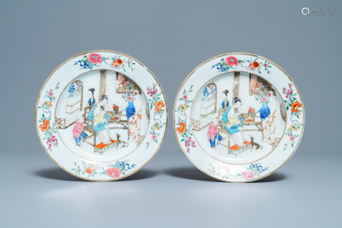 A pair of Chinese famille rose plates with a suckling