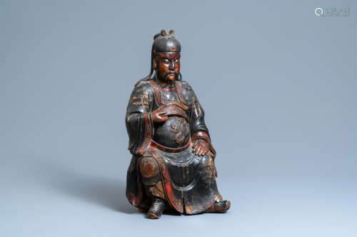 A large Chinese lacquered wood figure of Guandi, Kangxi