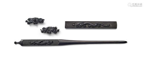 Goto Etsujo (1642-1708) and attributed to Goto Kenjo (1586-1663) A fine Goto-school shakudo mitokoromono (set of kozuka, kogai, and menuki) Momoyama (1573-1615) or Edo (1615-1868) period, 17th/18th century