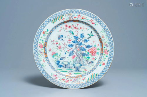 A large Chinese famille rose dish with birds among