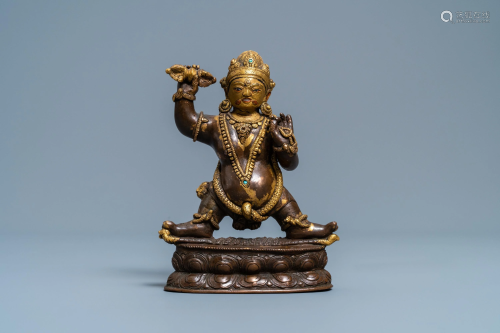 A Sino-Tibetan gilt bronze figure of Vajrapani, 17/18th