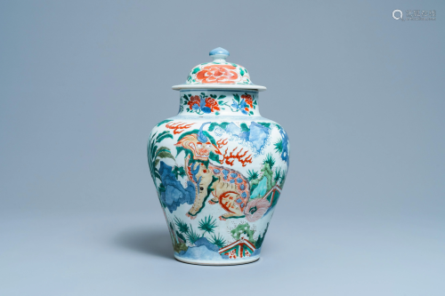 A Chinese wucai 'mythical beasts' vase and cover,